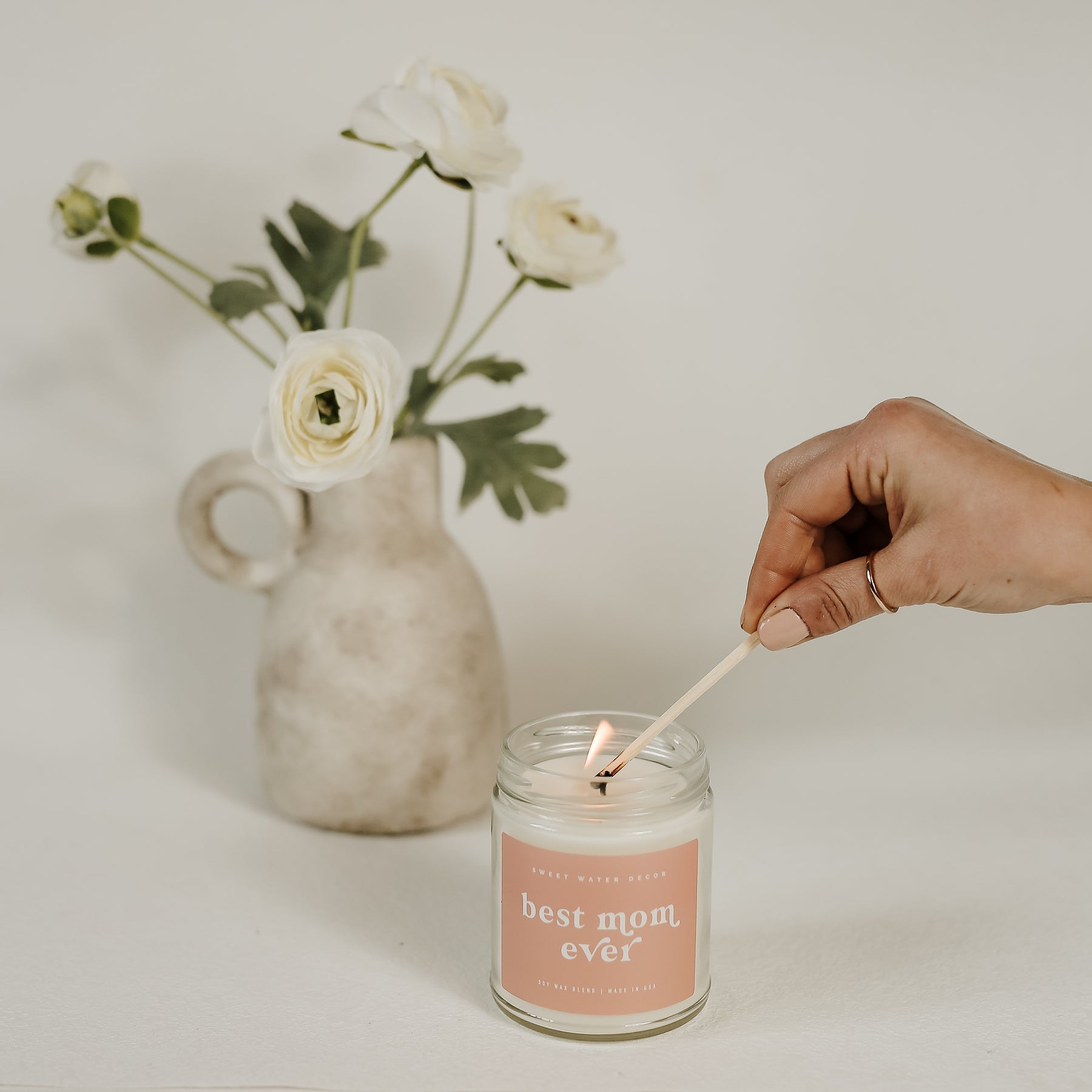 https://www.sweetwaterdecor.com/cdn/shop/products/CJ034-BEST-MOM-EVER-CANDLE-EDITORIAL-2023-SWEET-WATER-DECOR-8_1800x1800.jpg?v=1702575402