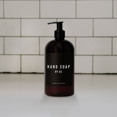 Amber plastic hand soap dispenser
