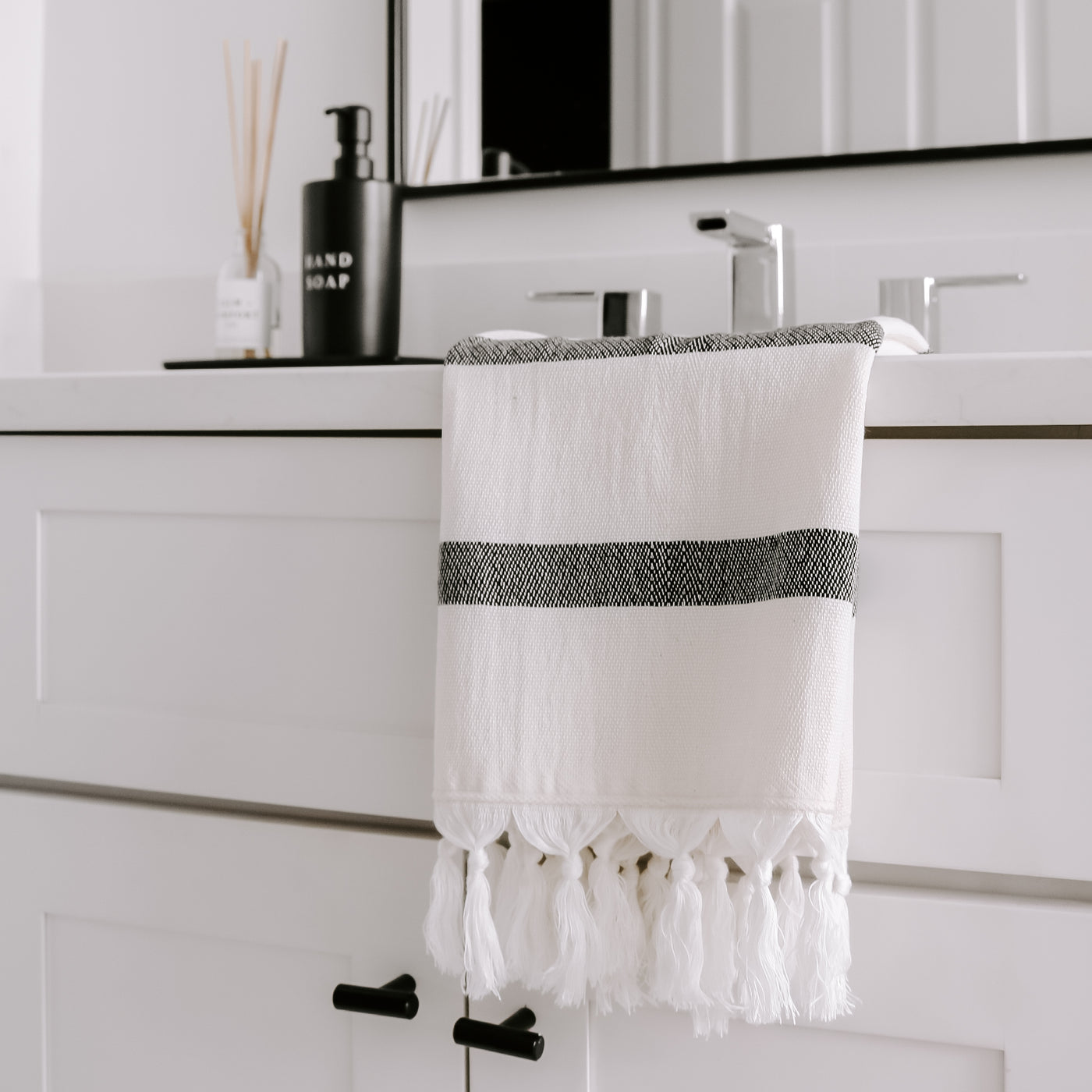 https://www.sweetwaterdecor.com/cdn/shop/products/HAND-TOWELS-DISPENSERS-4-22-SWEET-WATER-DECOR-18_1400x.jpg?v=1655291731