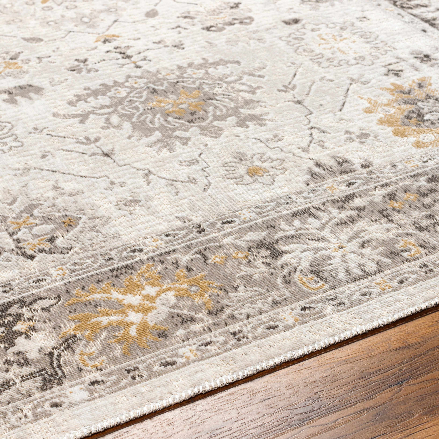 Arwel Cream Washable Area Rug